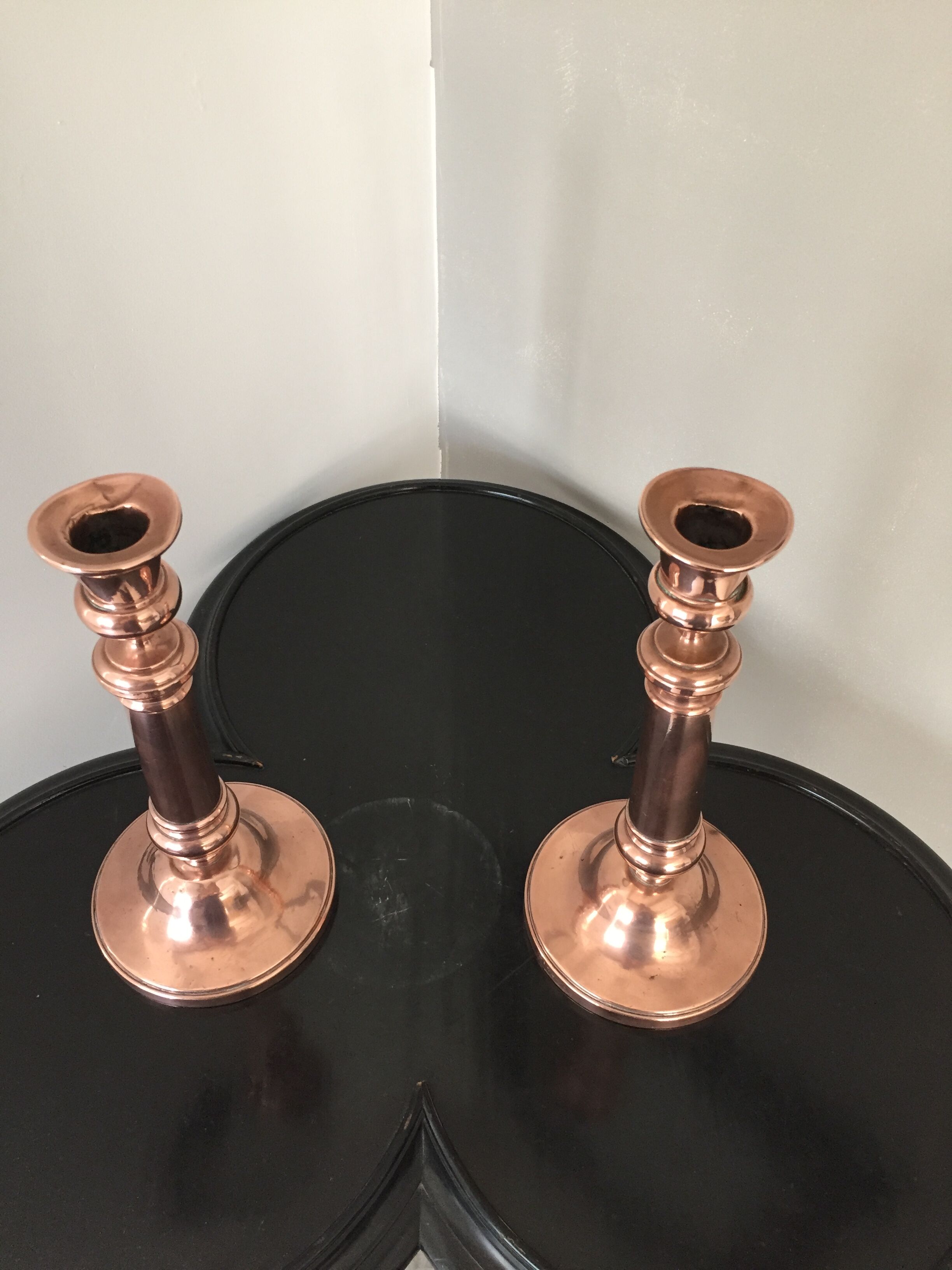 Pair of pink copper candlesticks