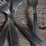 Mismatched set of 8 forks + 8 vintage shell stainless steel knives