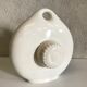 Old hot water bottle made of vintage white earthenware