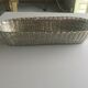 Braided silver metal bread basket