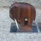 Pair of Art Deco elephant bookends in rosewood with chrome base.