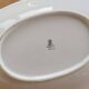Vintage white porcelain trays with a golden rim.