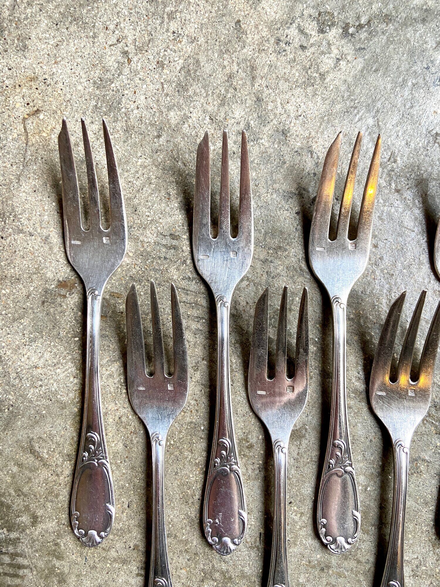 7 silver metal dessert forks