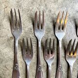7 silver metal dessert forks