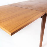 Dining table in teak with extension plates, of Danish design, 1960s