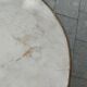Old bistro table with marble top and cast iron base.