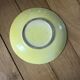 Yellow ceramic plate by Georges Jouve