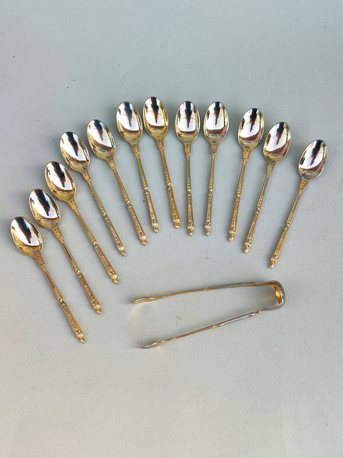 12 gilt metal teaspoons