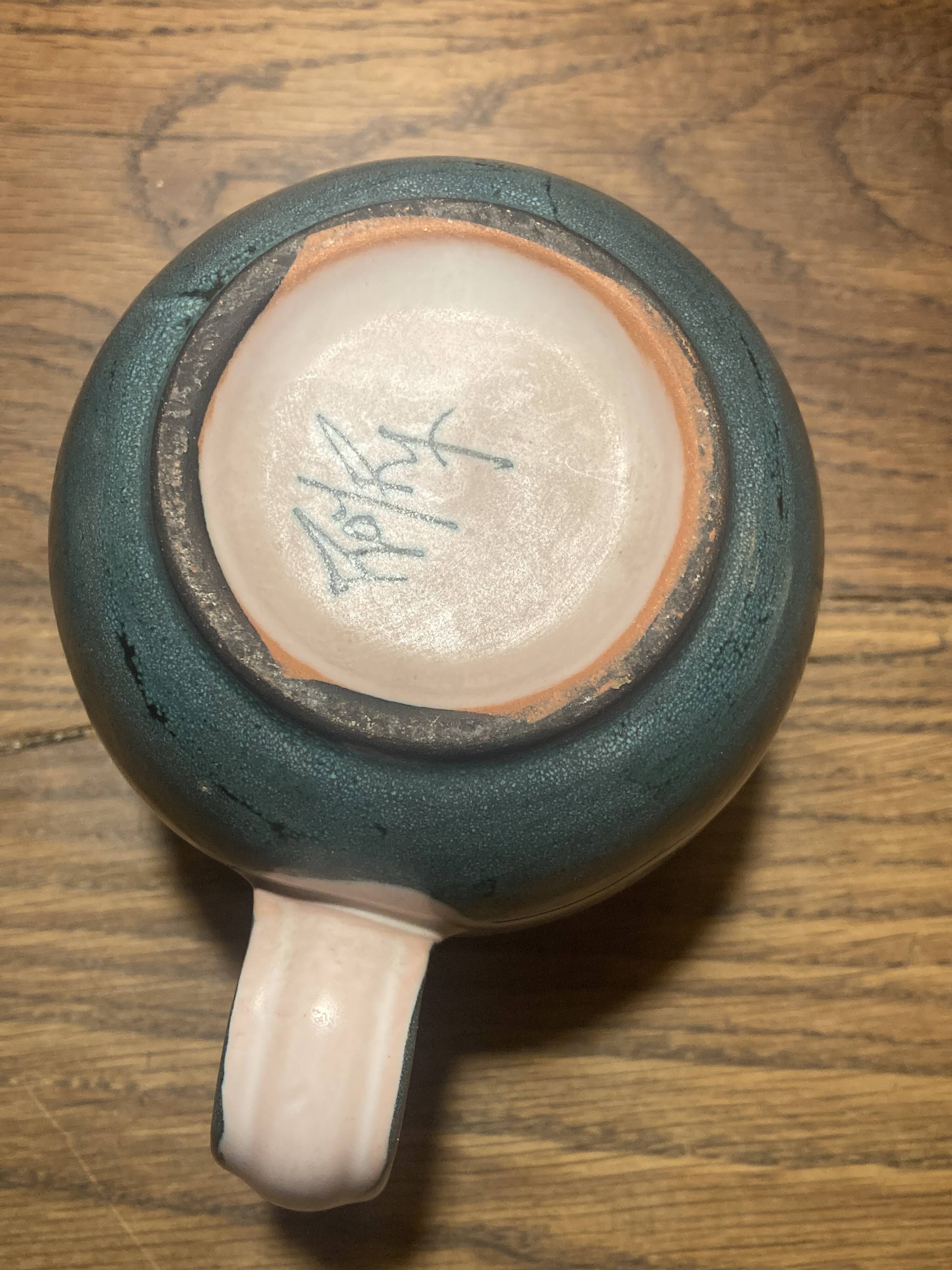 Set of two ceramic mugs signed Yvon ROY