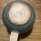 Set of two ceramic mugs signed Yvon ROY