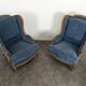 Pair of Louis XV style wingback armchairs in blue velvet.