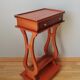 Pedestal table or English cherry saddle with lyre feet