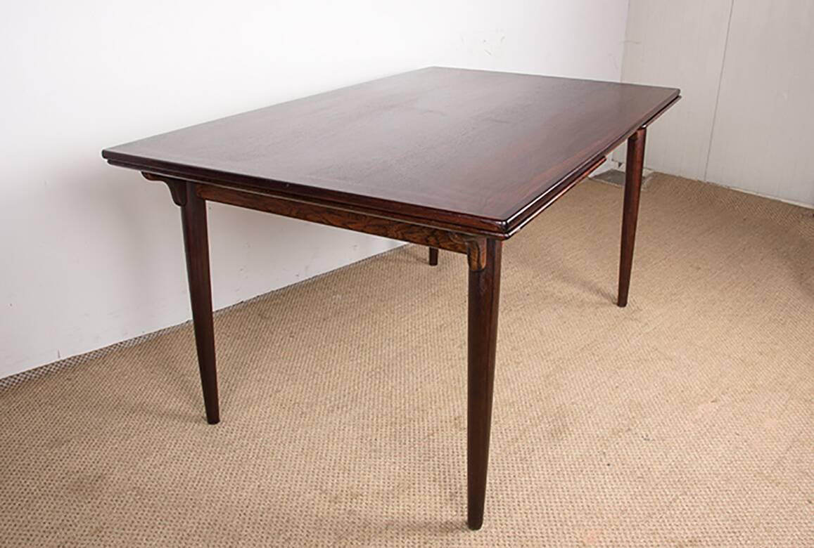 Danish extendable dining table in rosewood, model 54 by Gunni Omann