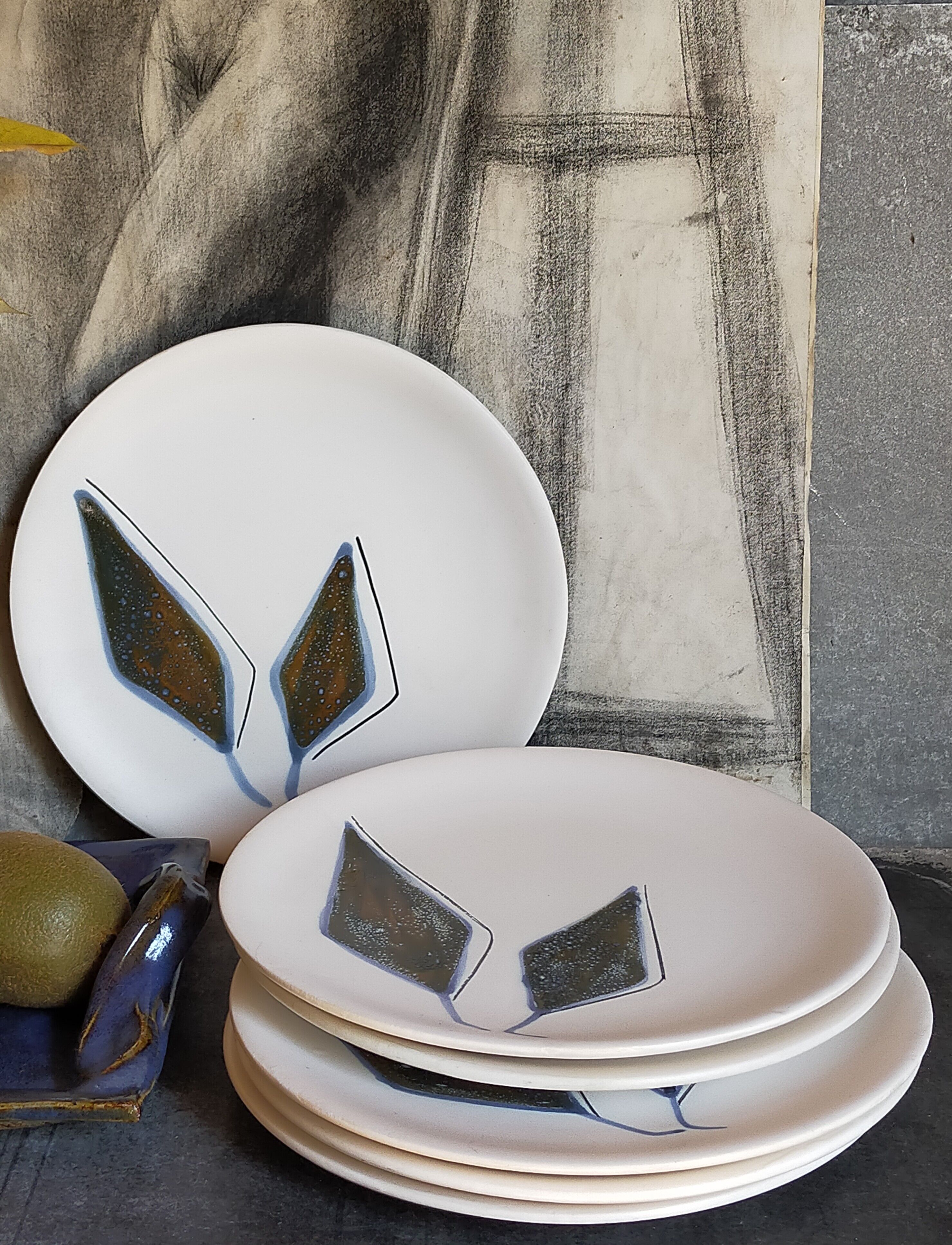 Six ceramic plates with matt enamel 50s