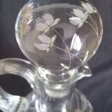 Wine carafe on foot, in cut and enameled glass