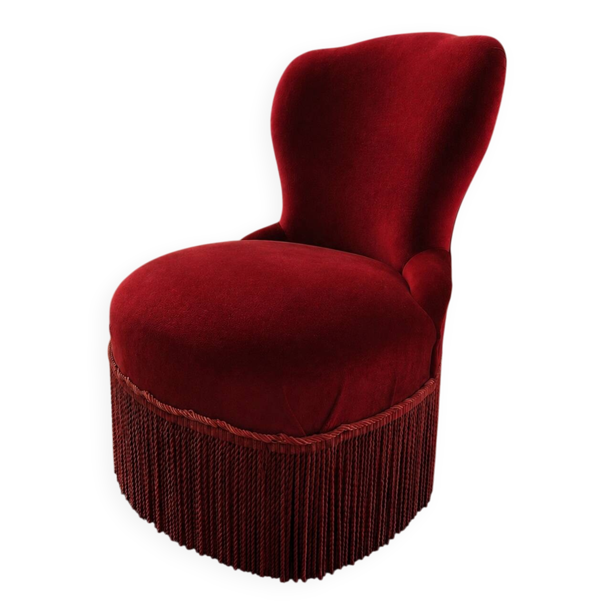 Vintage burgundy velvet armchair with fringes – theatrical and elegant