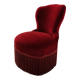 Vintage burgundy velvet armchair with fringes – theatrical and elegant