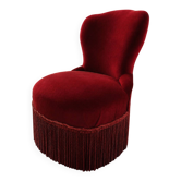 Vintage burgundy velvet armchair with fringes – theatrical and elegant