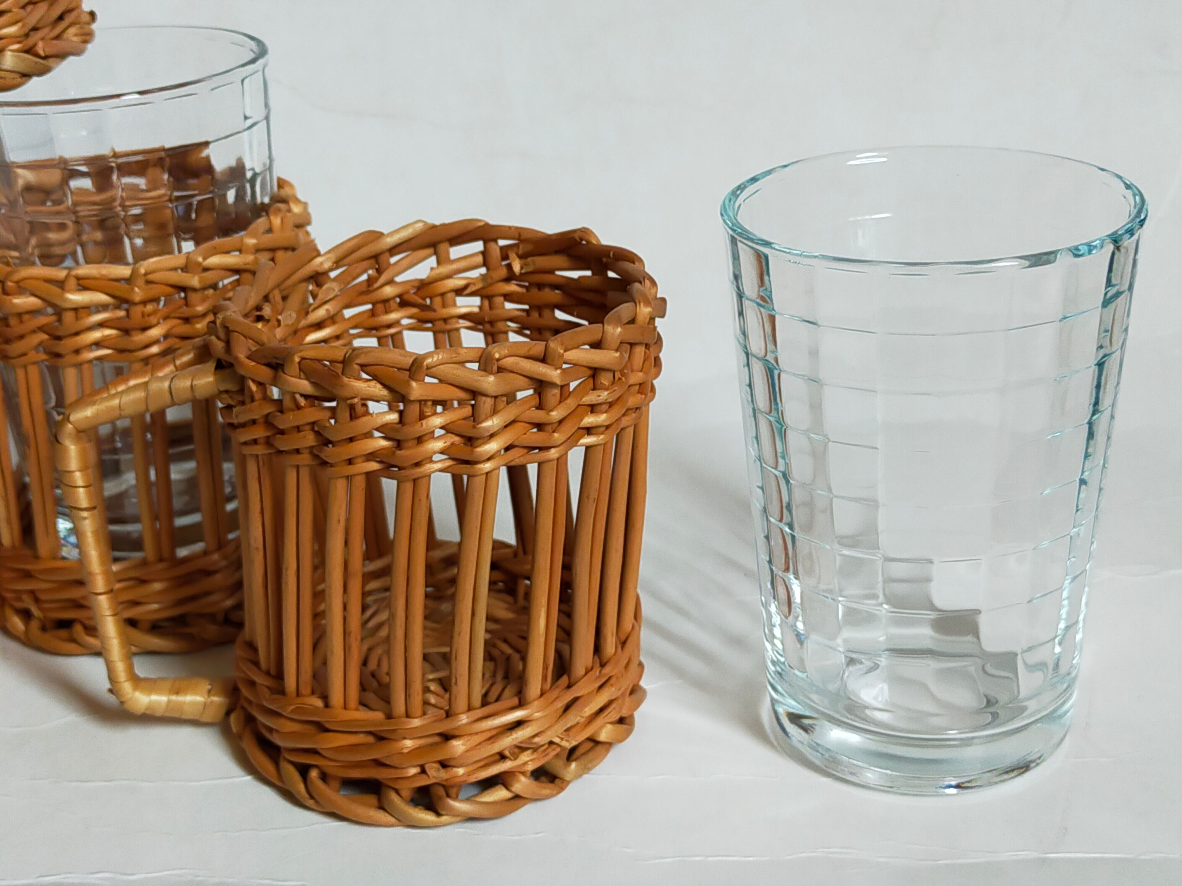 Six vintage 50s glasses in braided rattan cases