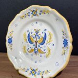 Earthenware plate decorated with winged character decoration in Nevers style, Auxerrois