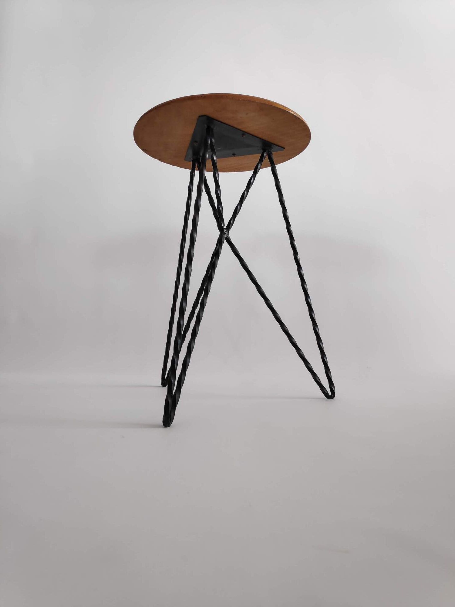 Vintage stool in wood and twisted metal of the years 60
