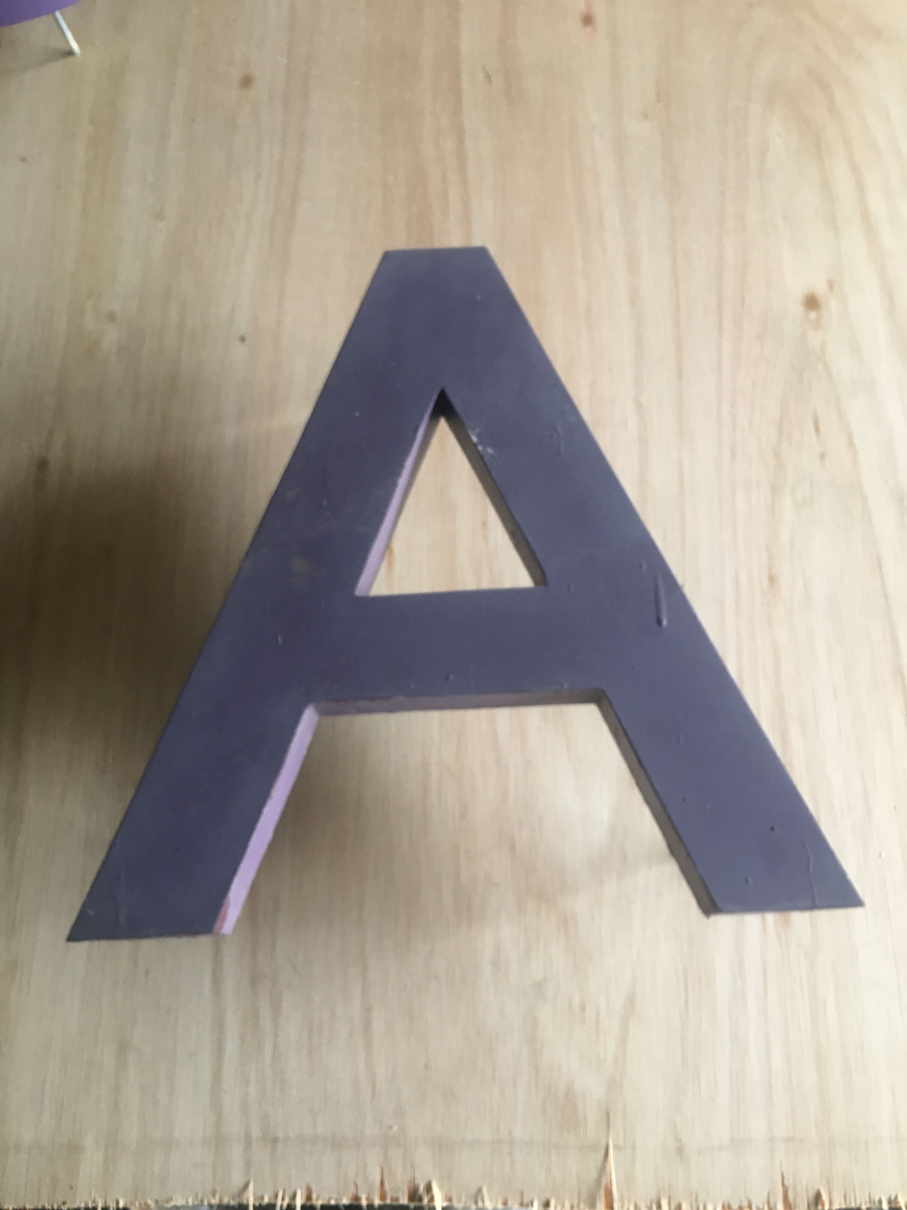 Industrial letter in zinc