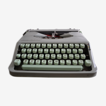 Machine à écrire Hermès Baby fonctionnelle+1 ruban offert