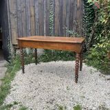 Old kitchen table with chopping board.
