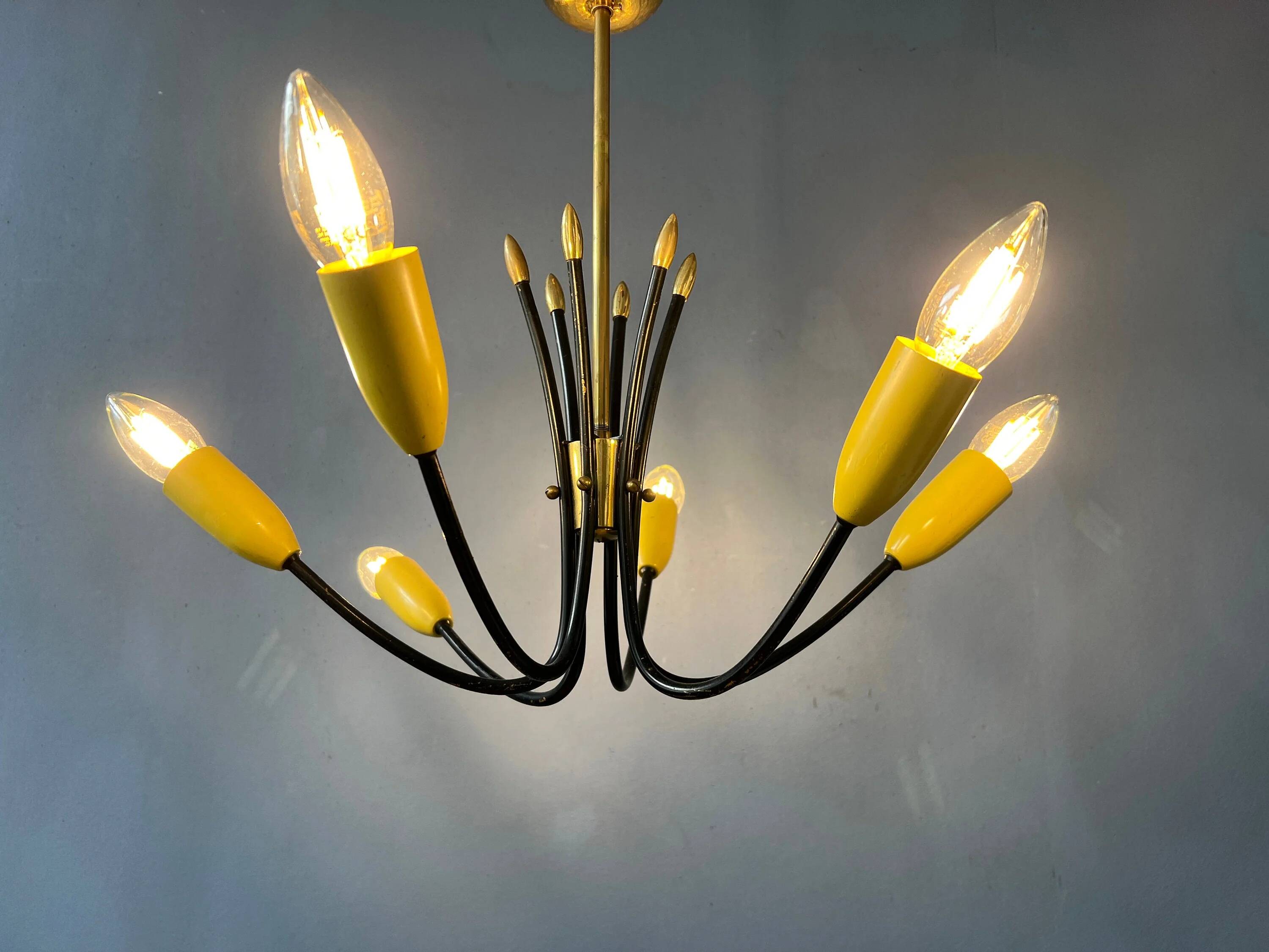 Vintage yellow spider suspension from the 1950s.