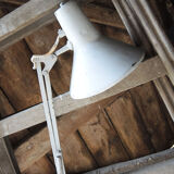 Old articulated workshop lamp in painted metal