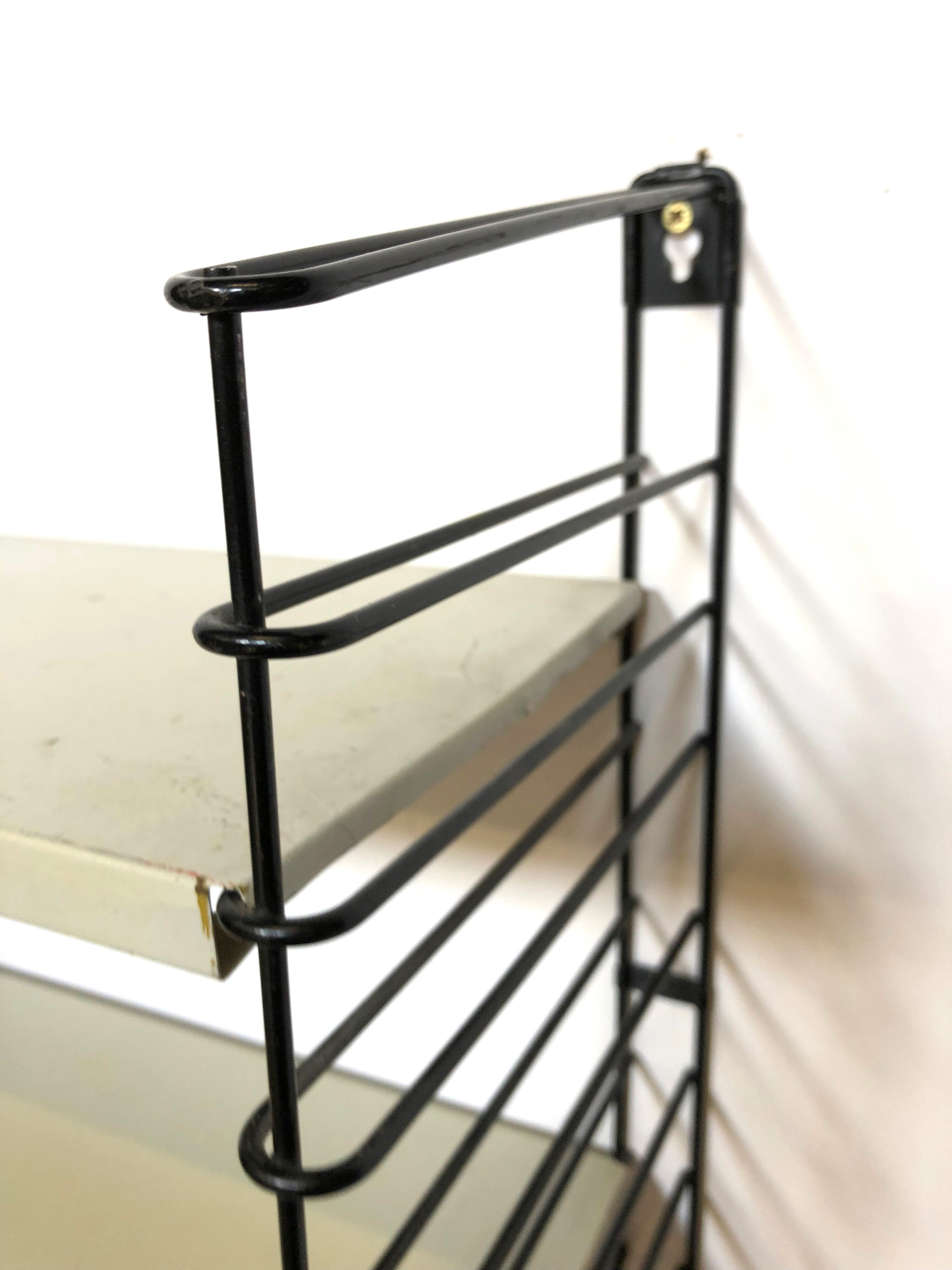 Vintage wall shelf Tomado Holland