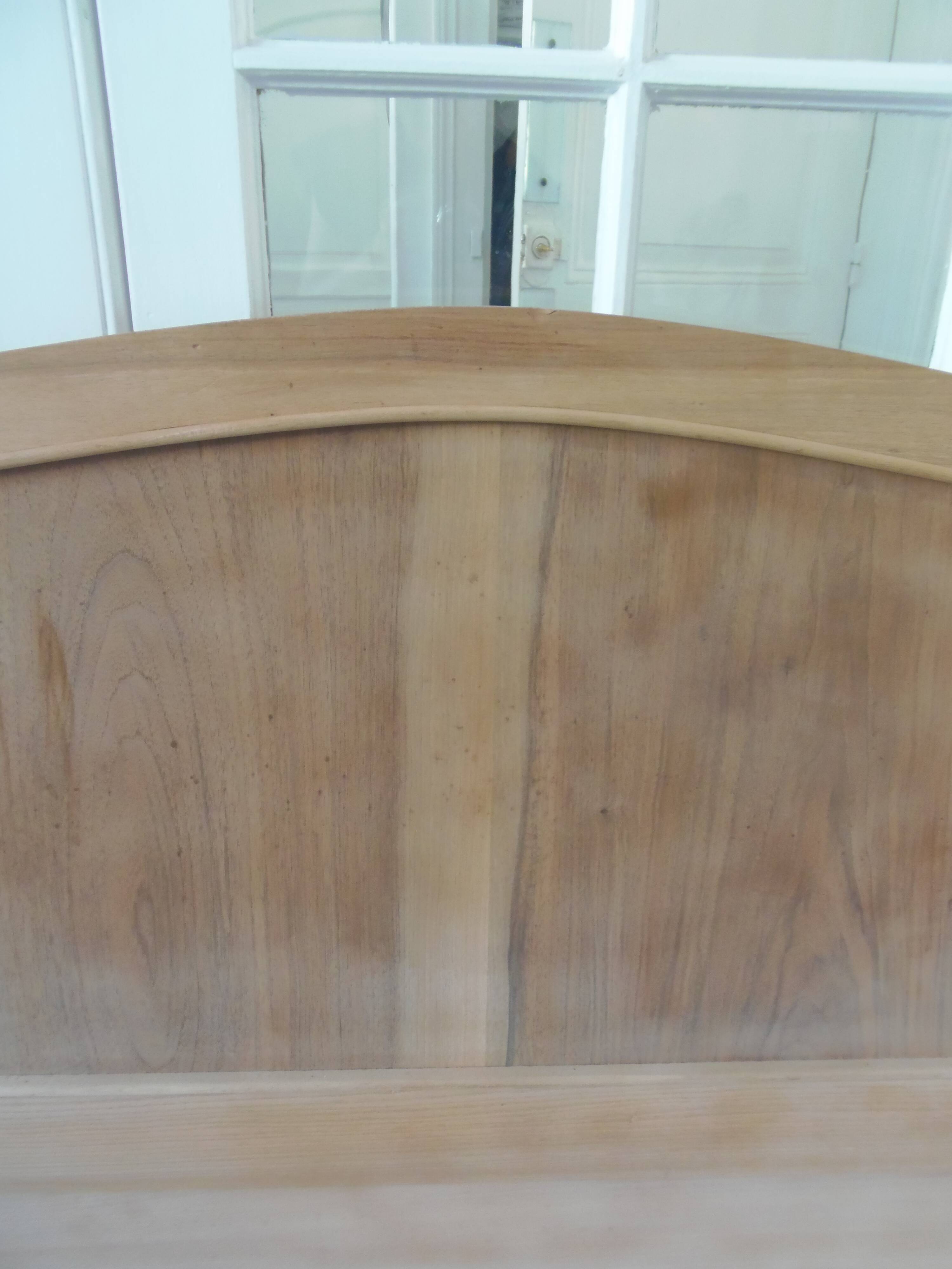 Headboard for a 160 bed in solid walnut with waxed finish.