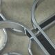 Sculpted Chrome Base Coffee Table with Glass Top