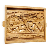 Bas relief in carved wood