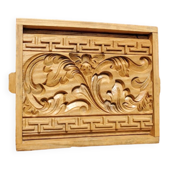 Bas relief en bois scuplté