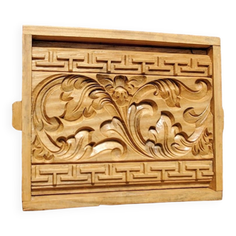 Bas relief in carved wood
