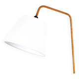 Floor lamp with magazine rack