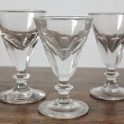 4 antique stemmed wine glasses with flat sides, made of blown glass from the 19th century