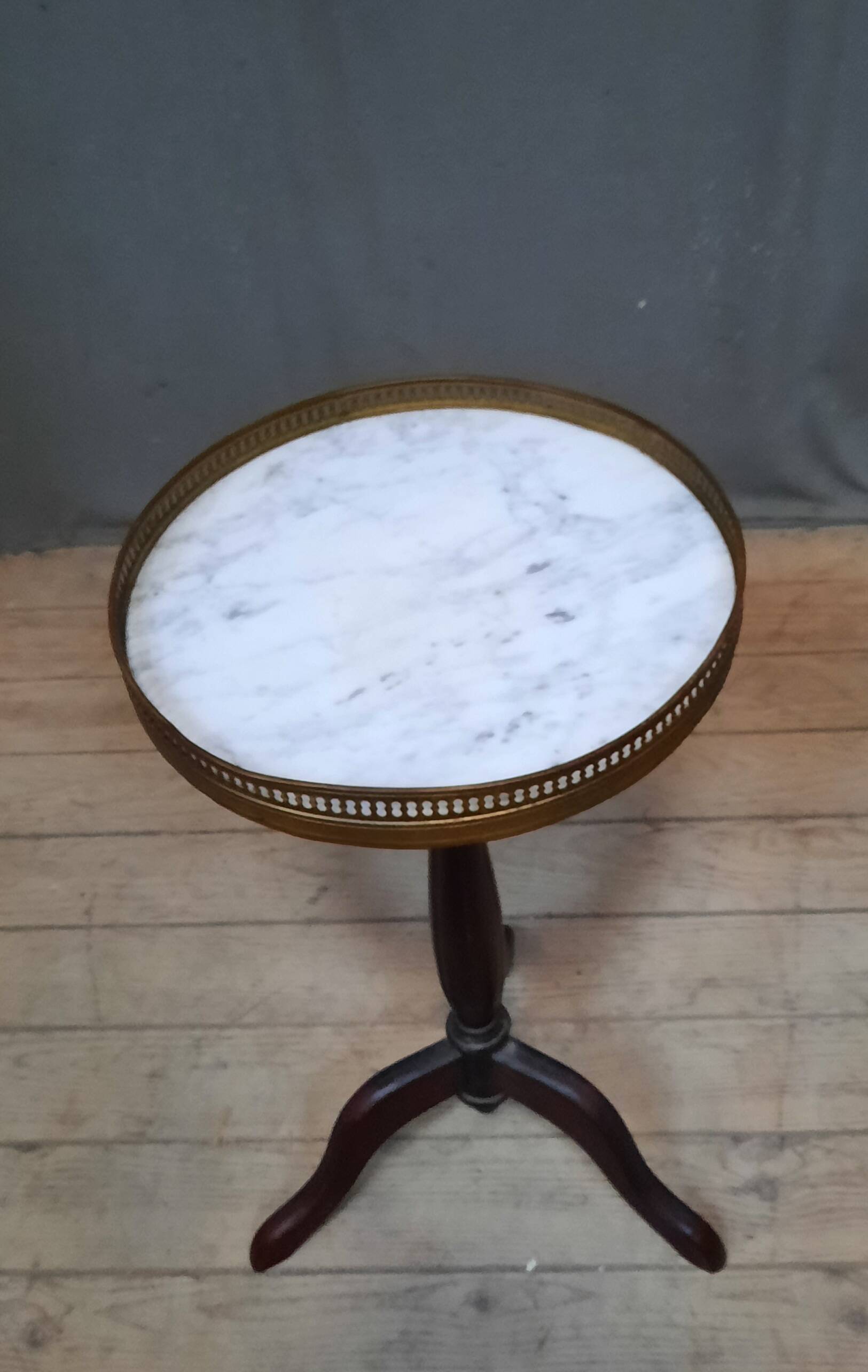 Small marble top pedestal table