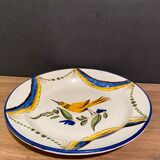 Large earthenware dish signed with bird decoration