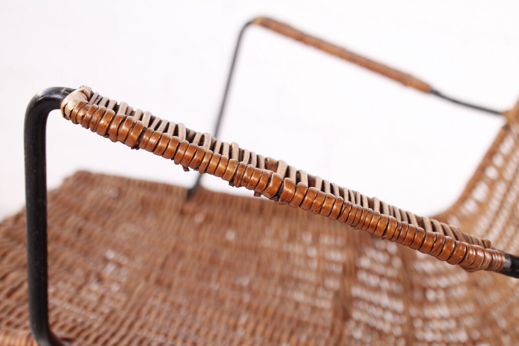Vintage wicker chair with armrests from the 1960s