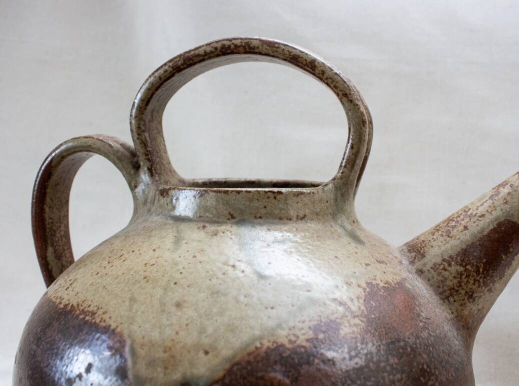 Old sandstone water pitcher.