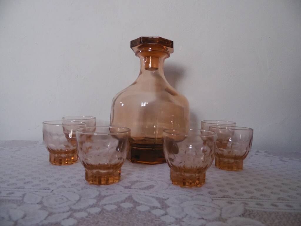 Pink glass liqueur carafe and 6 matching glasses