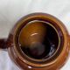 Brown glazed ceramic teapot