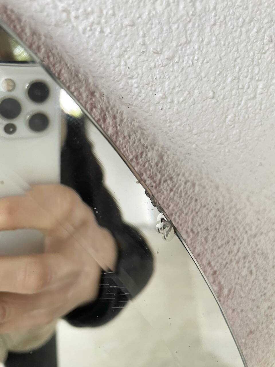 1950s oval beveled mirror