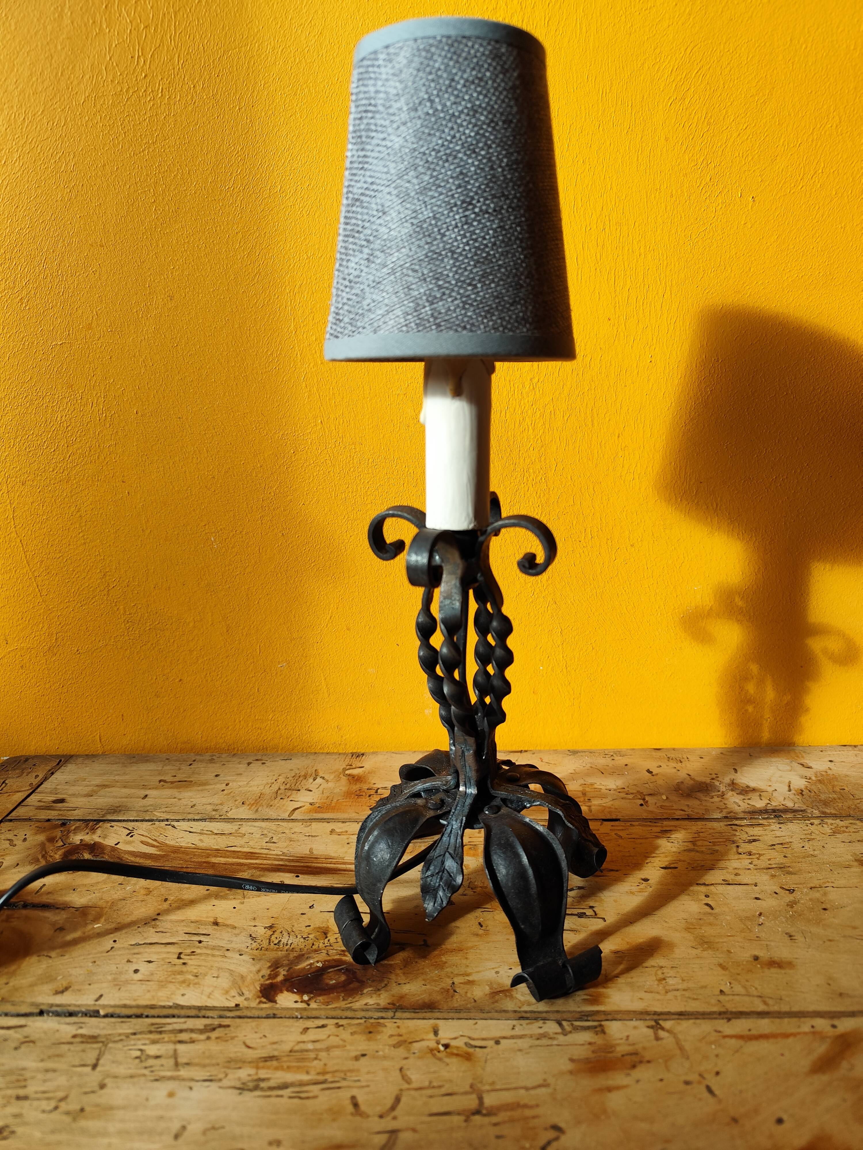 Old metal lamp and fake candle