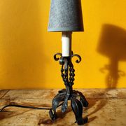 Old metal lamp and fake candle