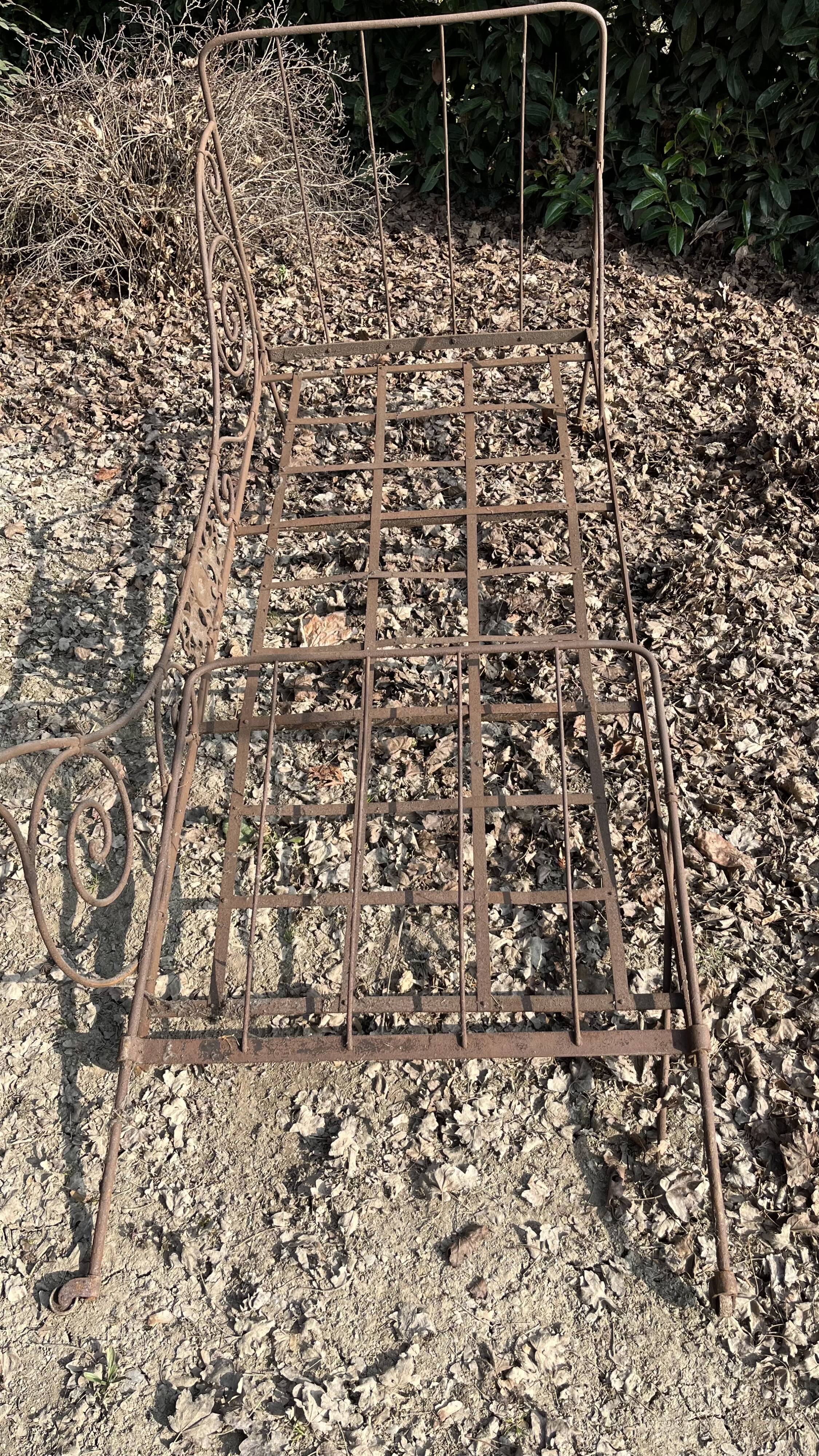 Folding wrought iron bed 1900