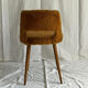 Camel barrel chair with faux fur by Baumann