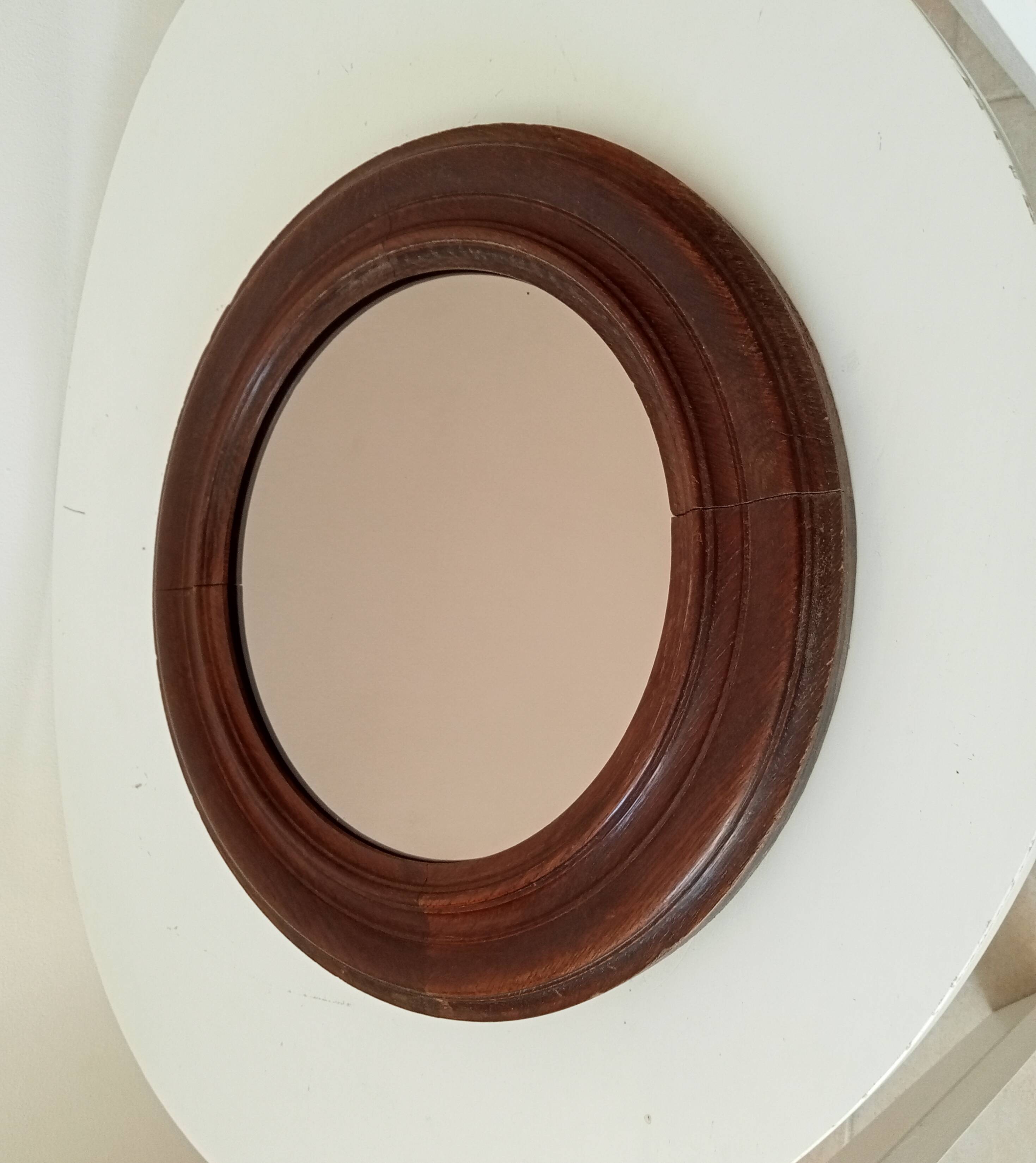 Antique round wooden mirror